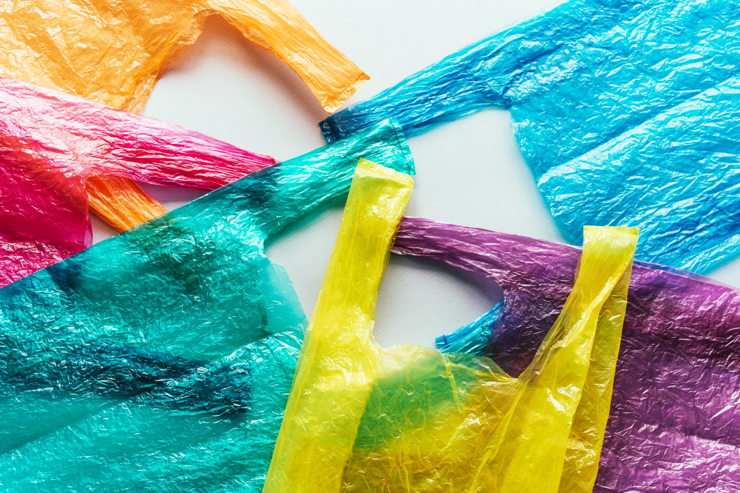 Several bright colored disposable plastic bags